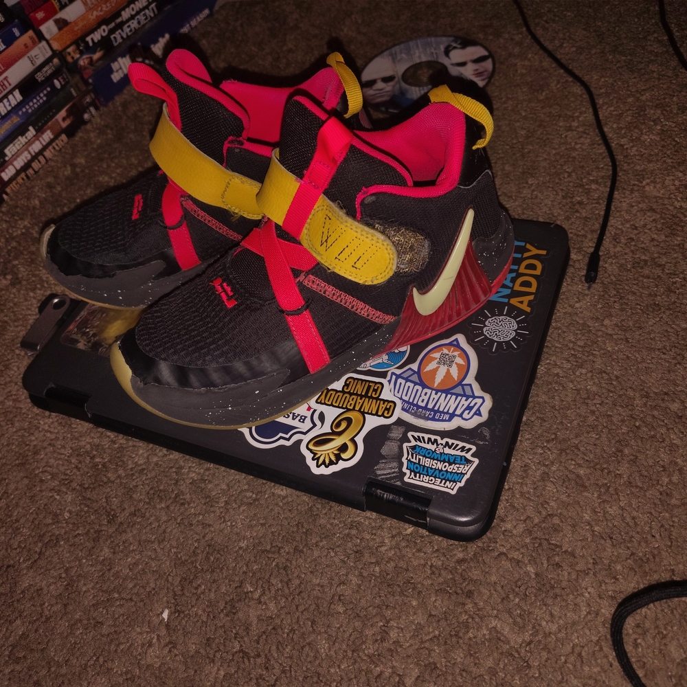 LeBron YouthBlack and Red Sneakers with Yellow Accents